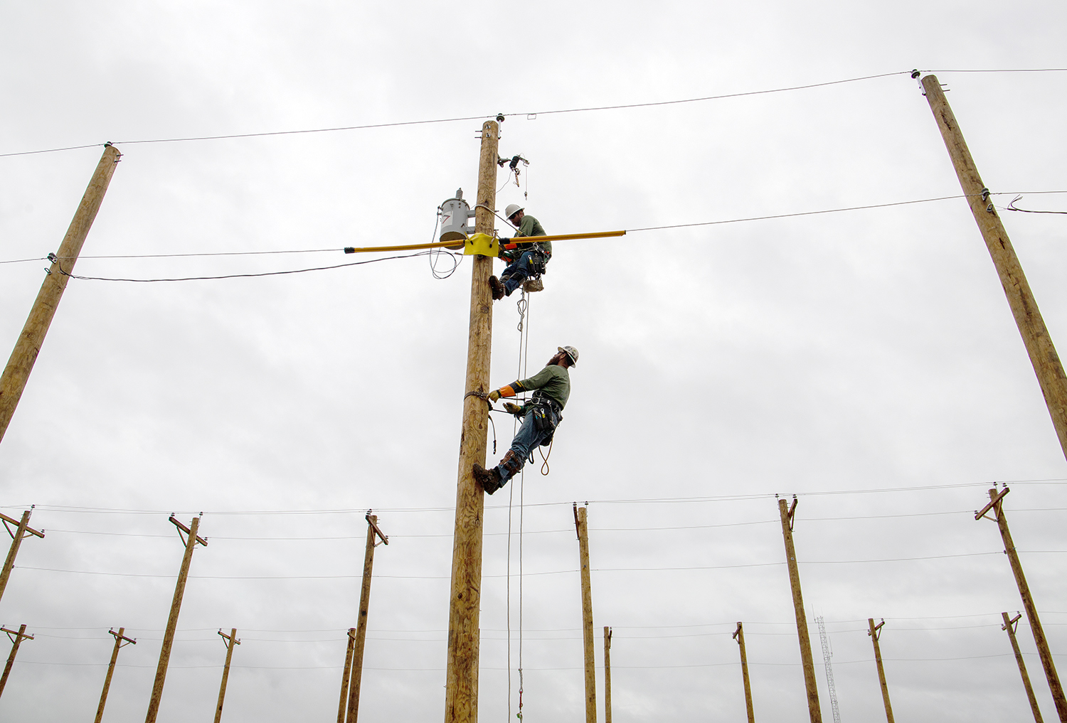 A different kind of rodeo ... GRDA linemen Dillon Wheatley (top) and Aaron Willliamson were two of the competitors in last week's Municipal Electric Systems of Oklahoma (MESO) Lineworker's Rodeo & Training, held in Ponca City.