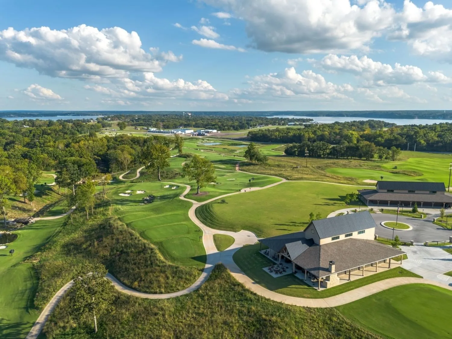 Aerial view of greens, trees and clubhouse on The Battlefield par-3 course at Shangri-La Resort