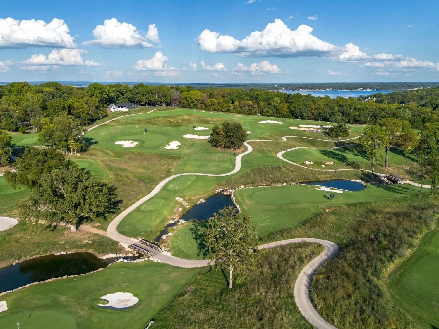 Aerial view of Legends Nine fairways, cart paths and ponds on Shangri-La Resort's 27-hole Championship Course